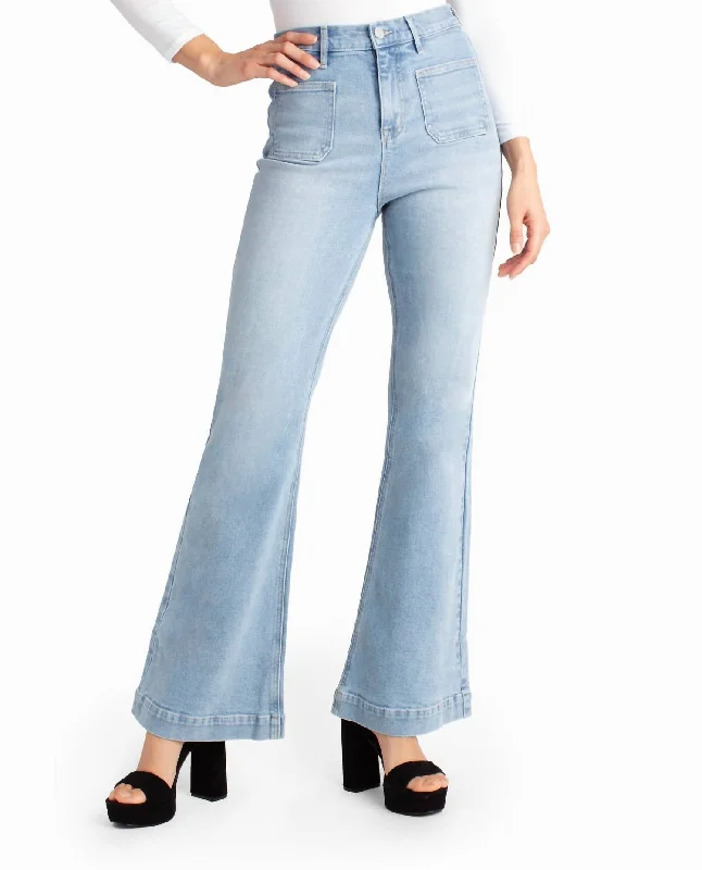 High-waisted tight trousers for women with flare leg and retro aesthetic -Sutton Place High Rise Flare Jean In Light Blue