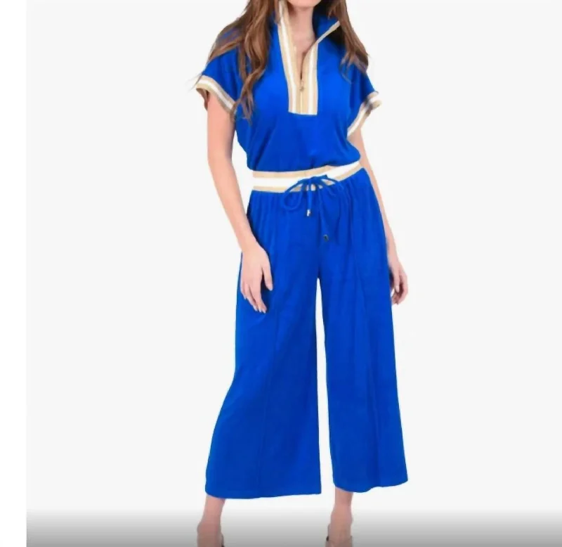 Tight trousers for women with side slits and ankle-length design for chic style -Teddy Crop Trouser In Blue