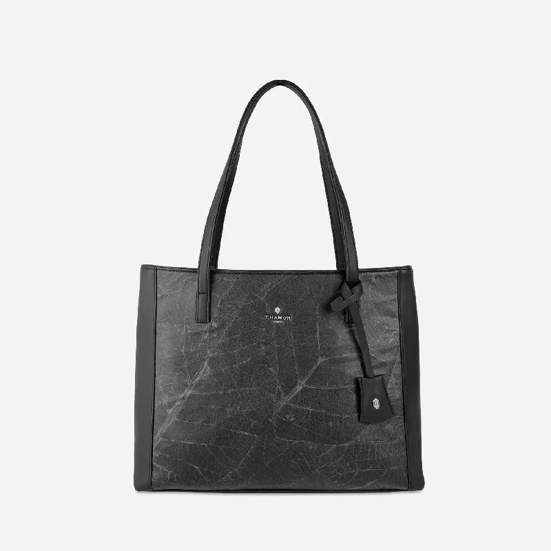 Handle bags with sturdy leather grip accents -Tote Bag