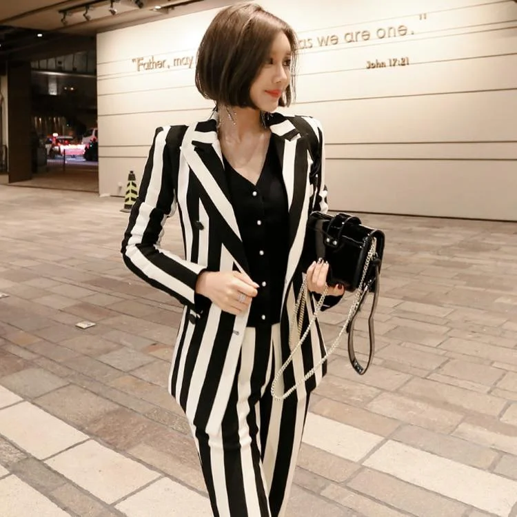 Blazers in pastel shades soften any look -Black and White Striped 2 Piece Broad Shoulder Blazer and Pants for Women