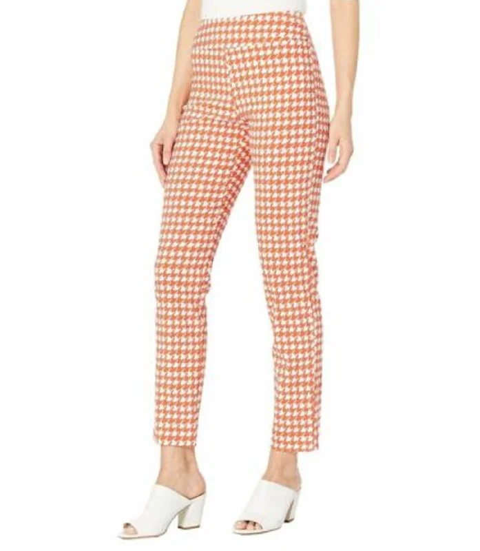 Fashion-forward tight trousers for women with metallic sheen and edgy design -Houndstooth Pull On Pant In Tangerine/white